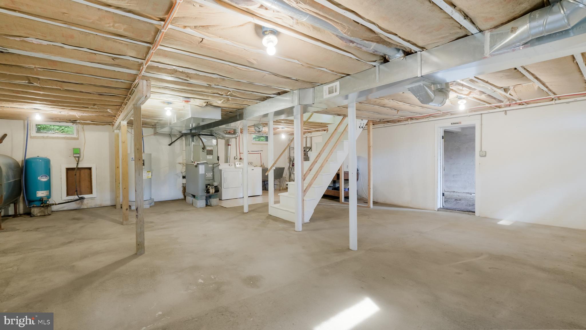 2443 Sugar Bottom Road Furlong, PA 18925 - Photo 26 of 39 a view of an empty room with stairs
