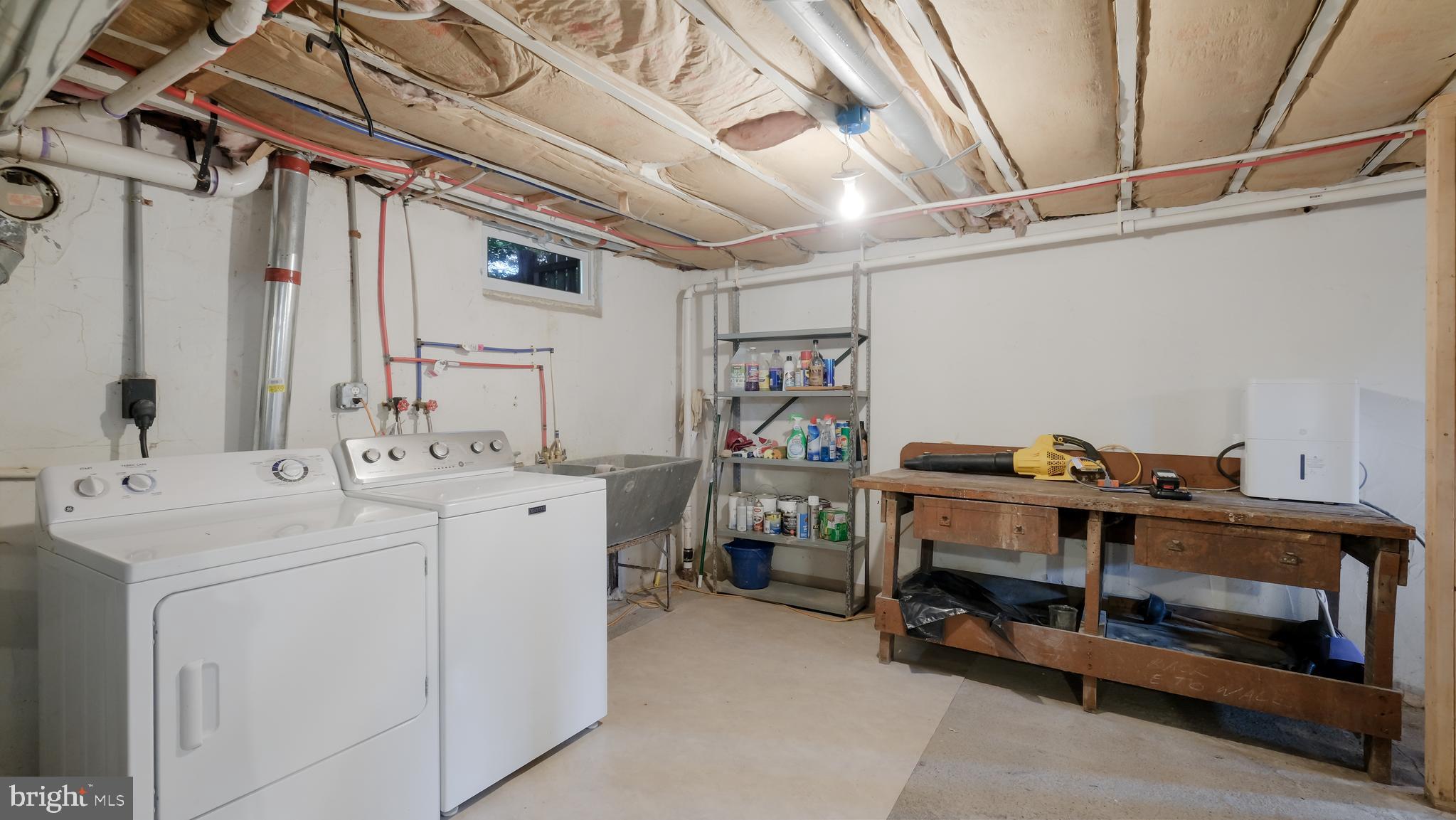 2443 Sugar Bottom Road Furlong, PA 18925 - Photo 27 of 39 a utility room with dryer and washer