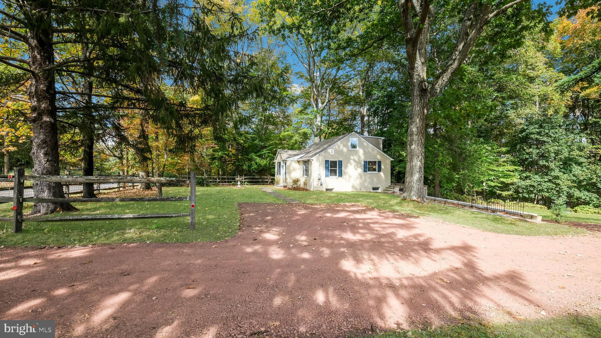 2443 Sugar Bottom Road Furlong, PA 18925 - Photo 30 of 39 a front view of a house with a yard