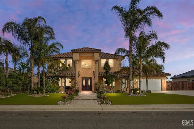 a view of a park with a palm tree