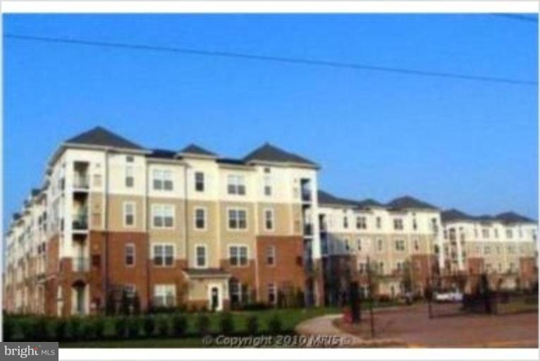 3820 Lightfoot Street, Unit 114 Chantilly, VA 20151 - Photo 1 of 1 a view of a building