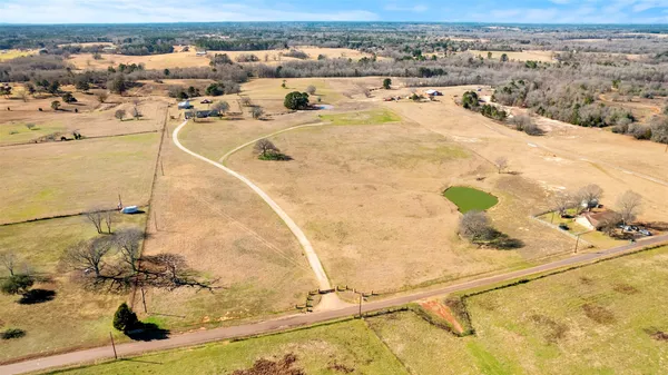 a view of a lake with beach