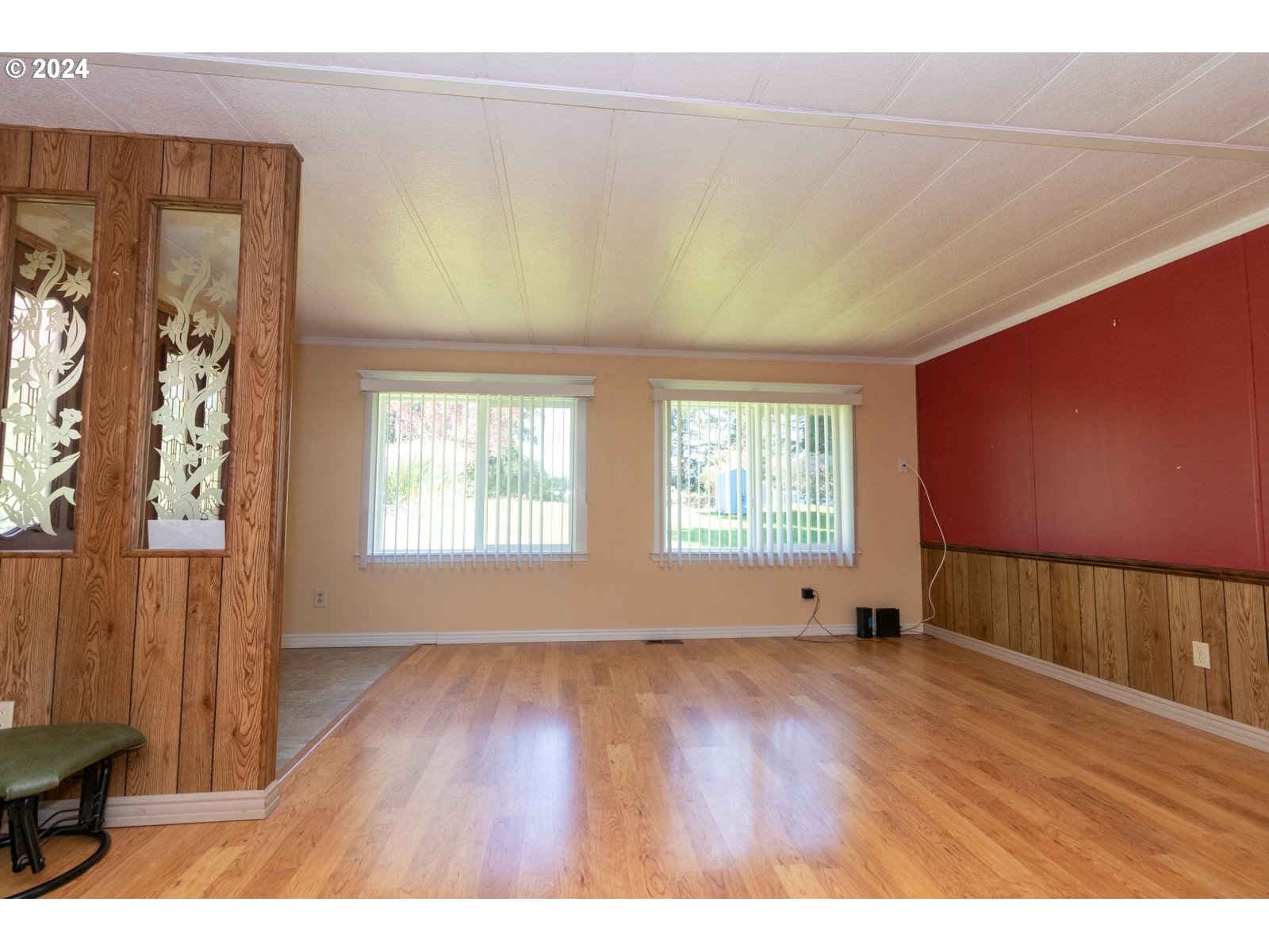 83200 South Pioneer Road Florence, OR 97439 - Photo 9 of 41 a view of an empty room with wooden floor and a window