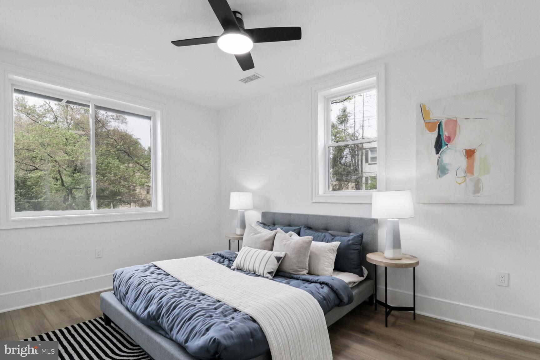 2524 41st Street Northwest, Unit 1 Washington, DC 20007 - Photo 14 of 27 a bedroom with a bed and a window