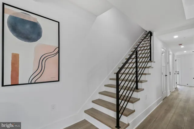 a bed room with a bed and a window