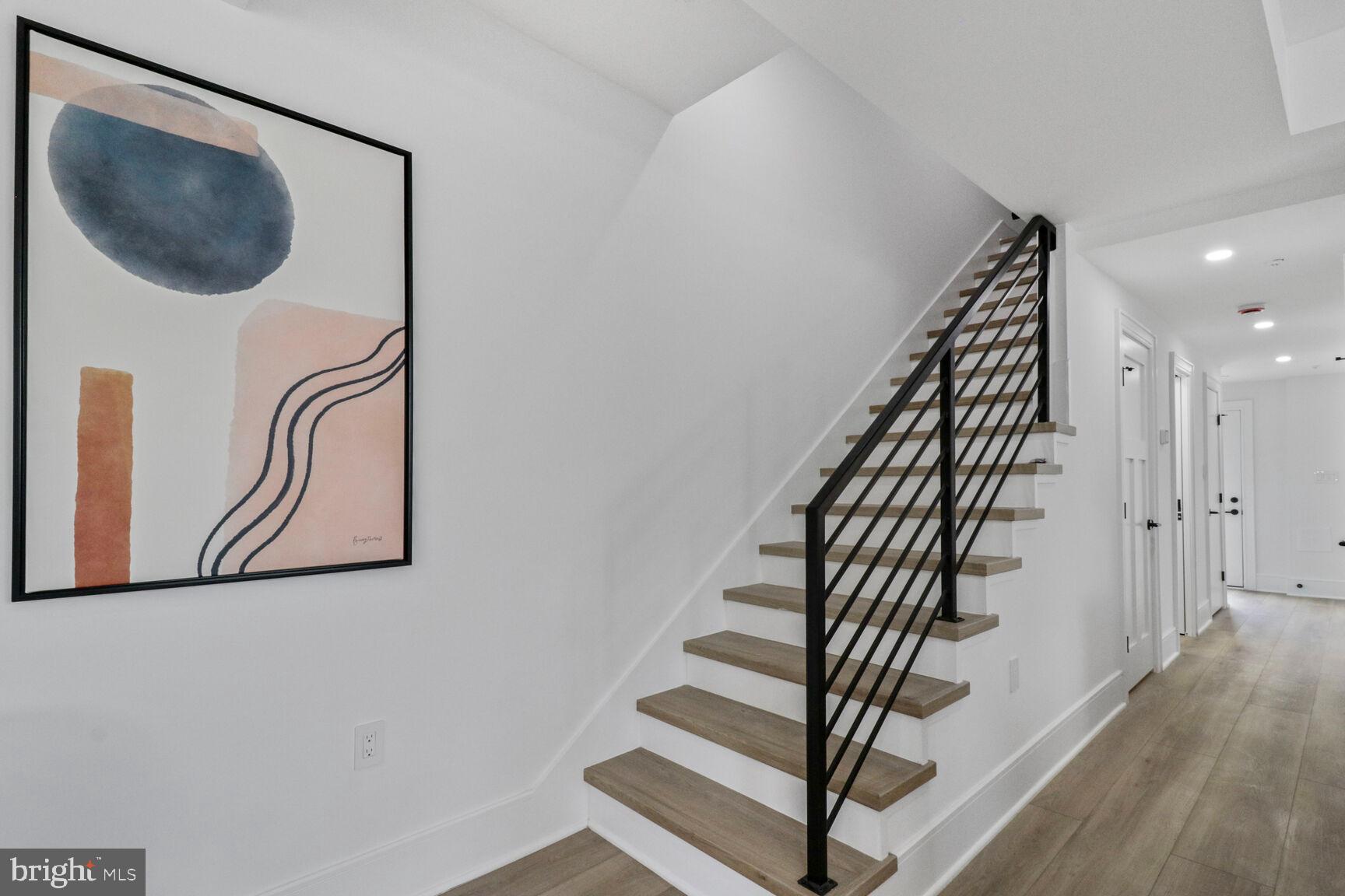 2524 41st Street Northwest, Unit 1 Washington, DC 20007 - Photo 15 of 27 a view of entryway and hall with wooden floor