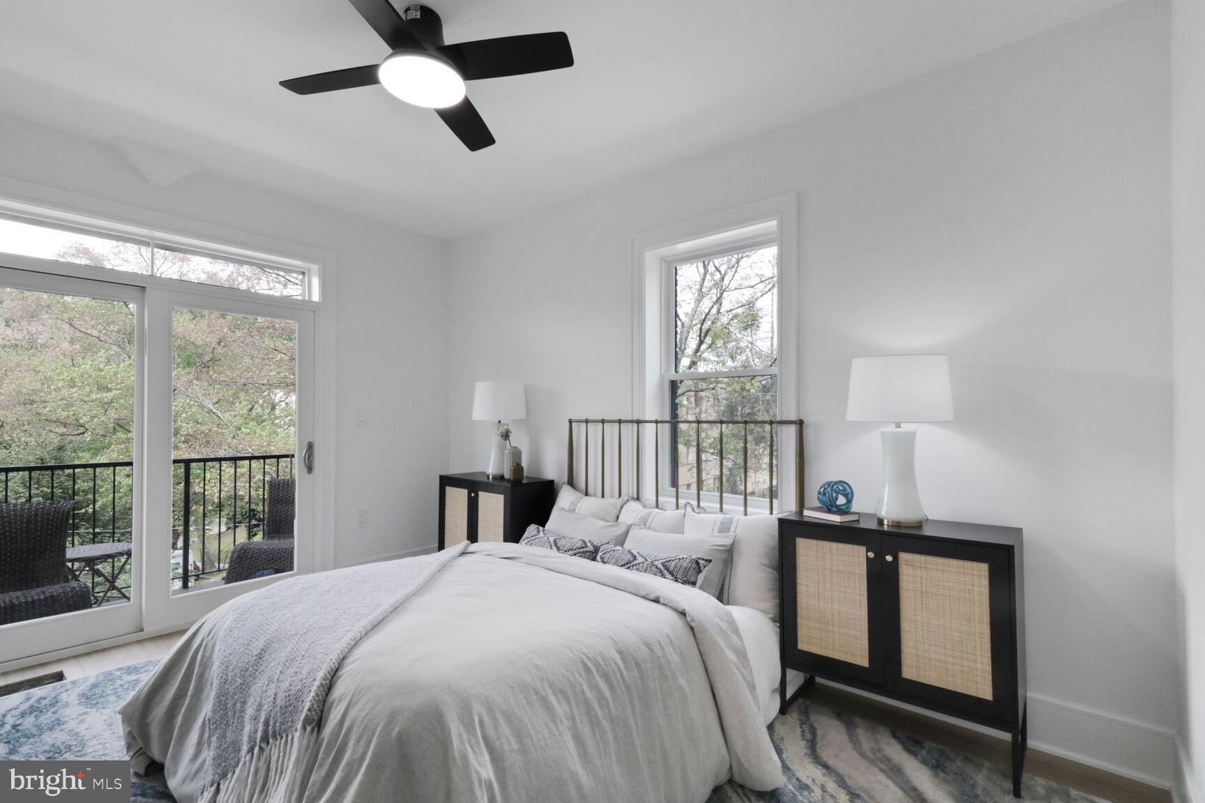 2524 41st Street Northwest, Unit 1 Washington, DC 20007 - Photo 16 of 27 a bed room with a bed and a window