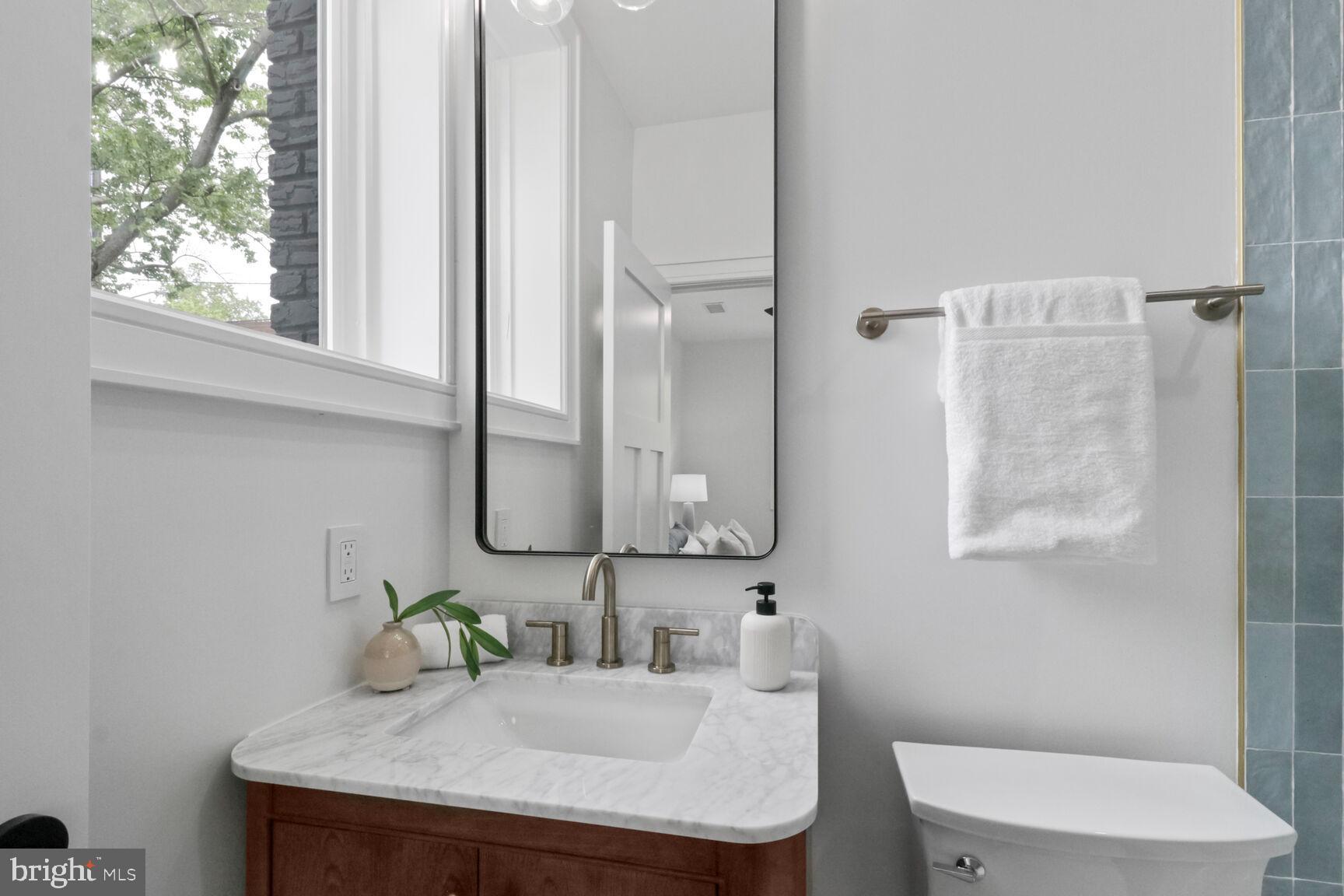 2524 41st Street Northwest, Unit 1 Washington, DC 20007 - Photo 20 of 27 a bathroom with a sink and a toilet