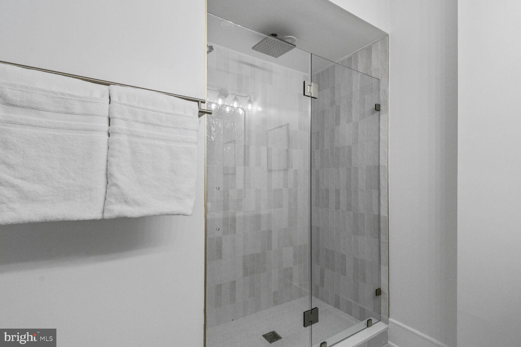 2524 41st Street Northwest, Unit 1 Washington, DC 20007 - Photo 24 of 27 a bathroom with a shower