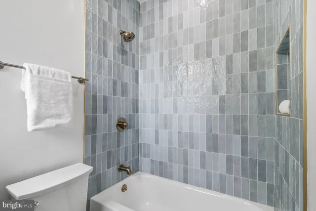 a view of house with yard and entertaining space