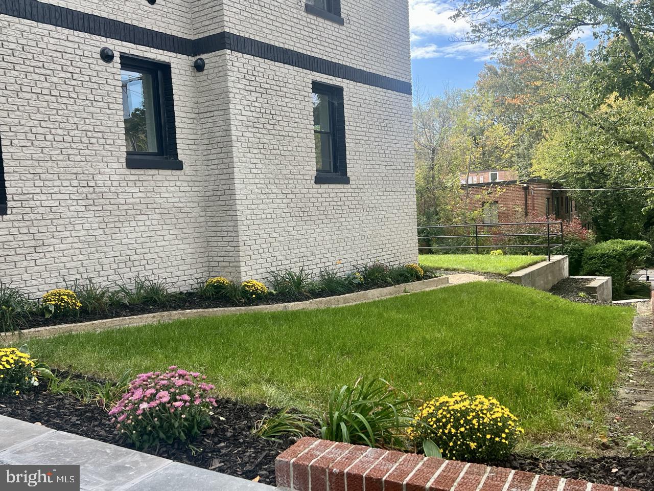 2524 41st Street Northwest, Unit 1 Washington, DC 20007 - Photo 3 of 27 a view of a backyard with potted plants
