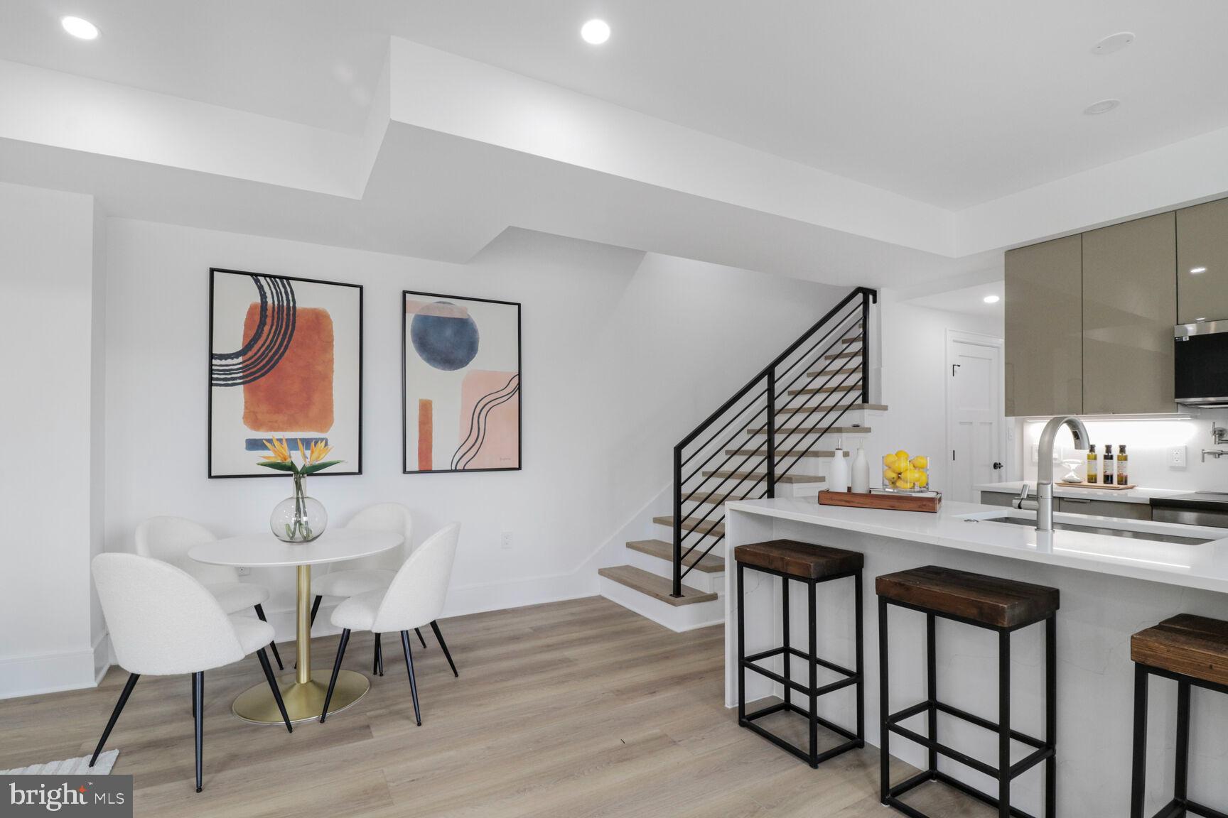 2524 41st Street Northwest, Unit 1 Washington, DC 20007 - Photo 6 of 27 a view of a dining room with furniture and wooden floor