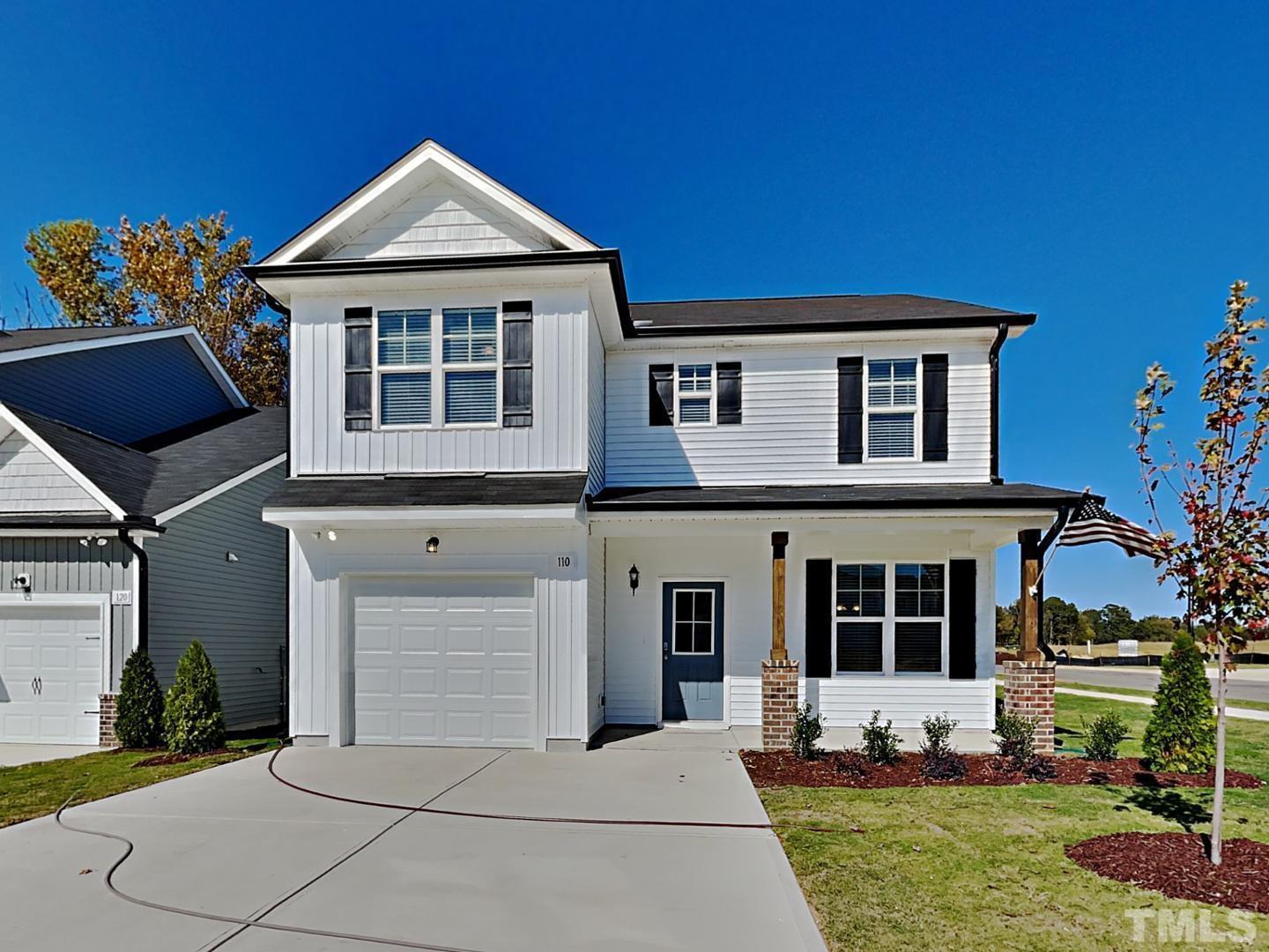 110 Shore Court Smithfield, NC 27577 - Photo 11 of 17 a front view of a house with a yard