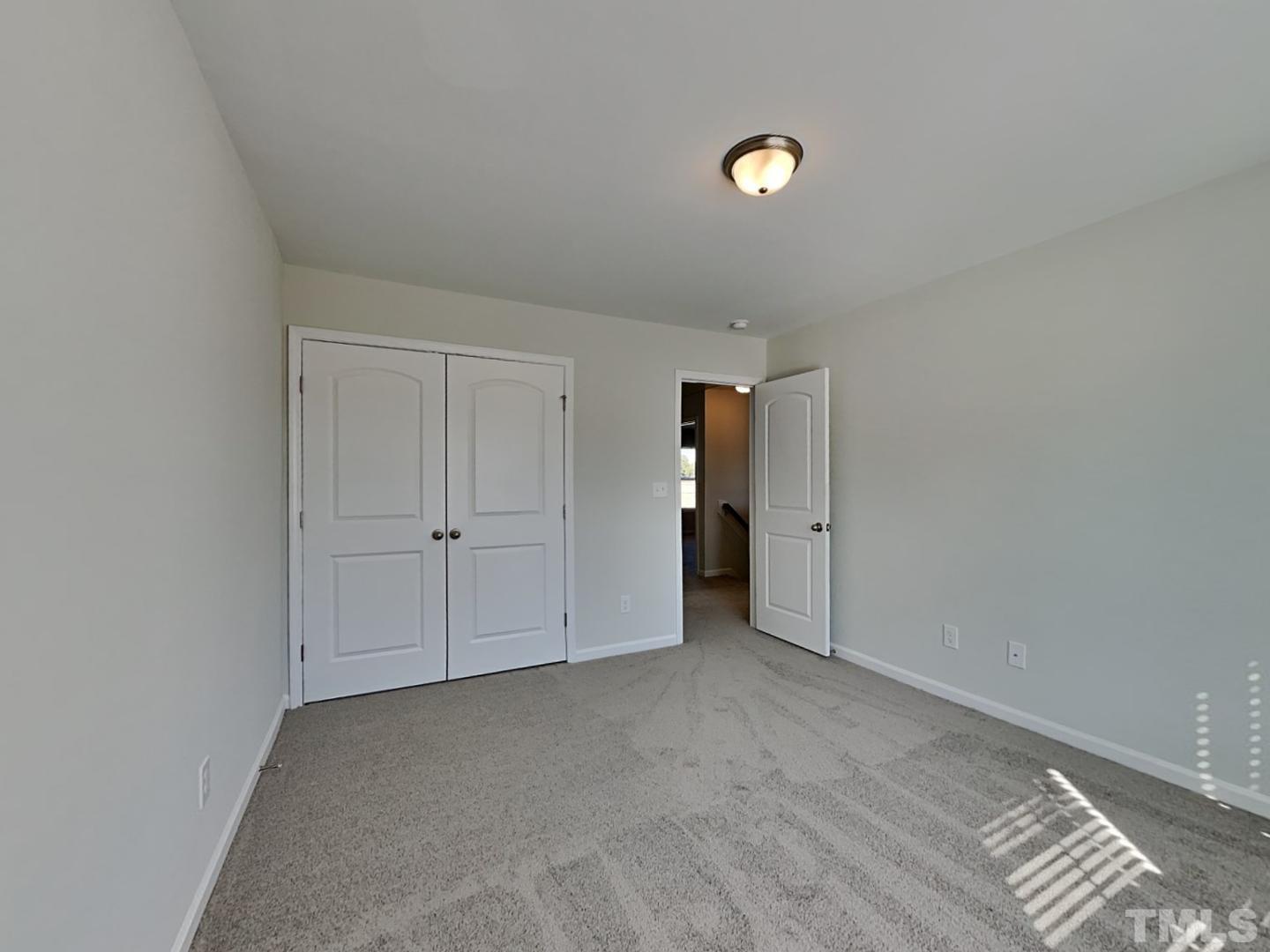 110 Shore Court Smithfield, NC 27577 - Photo 4 of 17 a view of an empty room