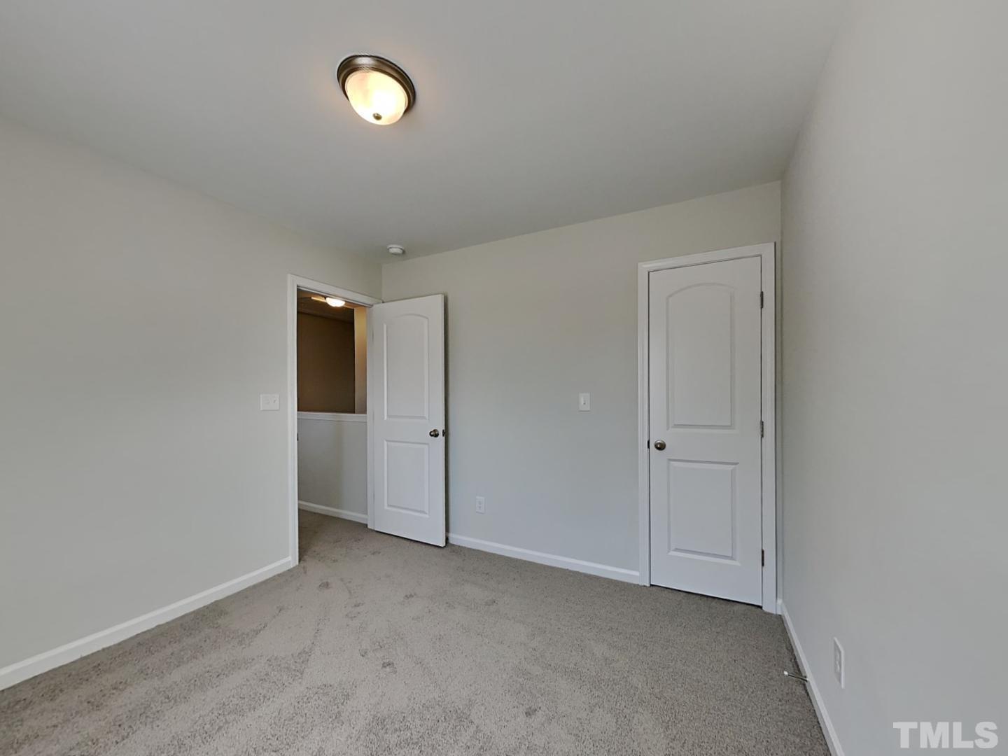 110 Shore Court Smithfield, NC 27577 - Photo 6 of 17 a view of an empty room with a window