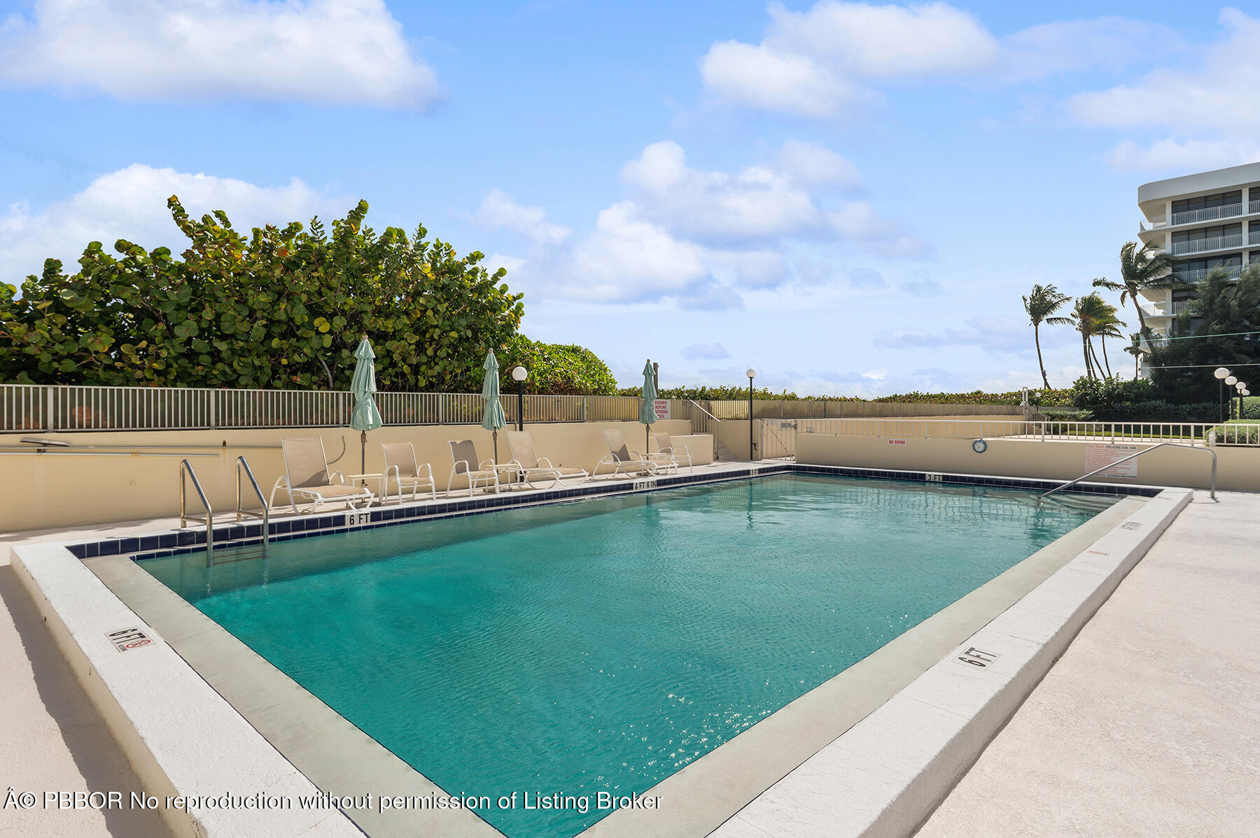 2565 South Ocean Boulevard, Unit 118 Palm Beach, FL 33480 - Photo 10 of 11 a view of a backyard with a lake view