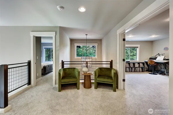 a living room with furniture and windows