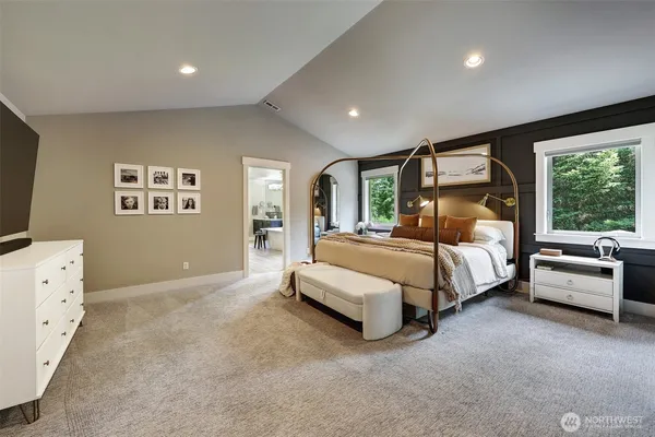 a bed room with a bed and a couch