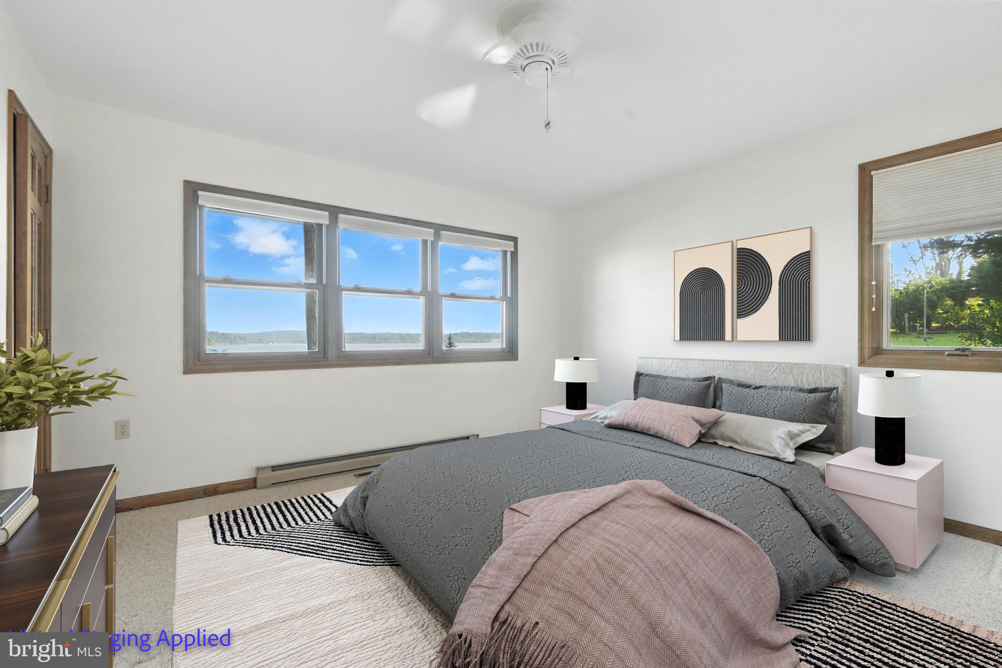 19 Tower Road Chesapeake City, MD 21915 - Photo 11 of 31 a bedroom with a large bed and a window