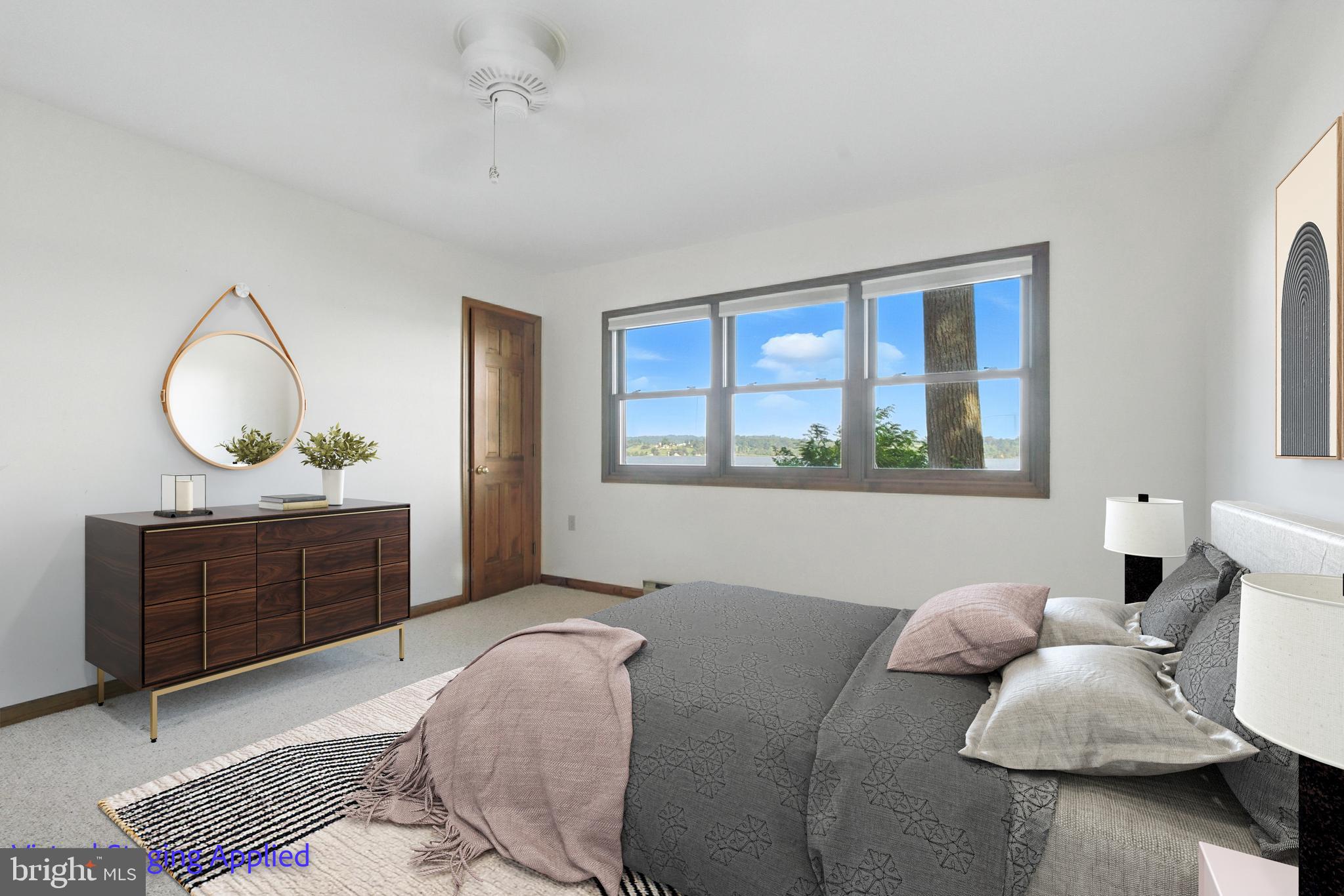 19 Tower Road Chesapeake City, MD 21915 - Photo 12 of 31 a bedroom with a bed and window