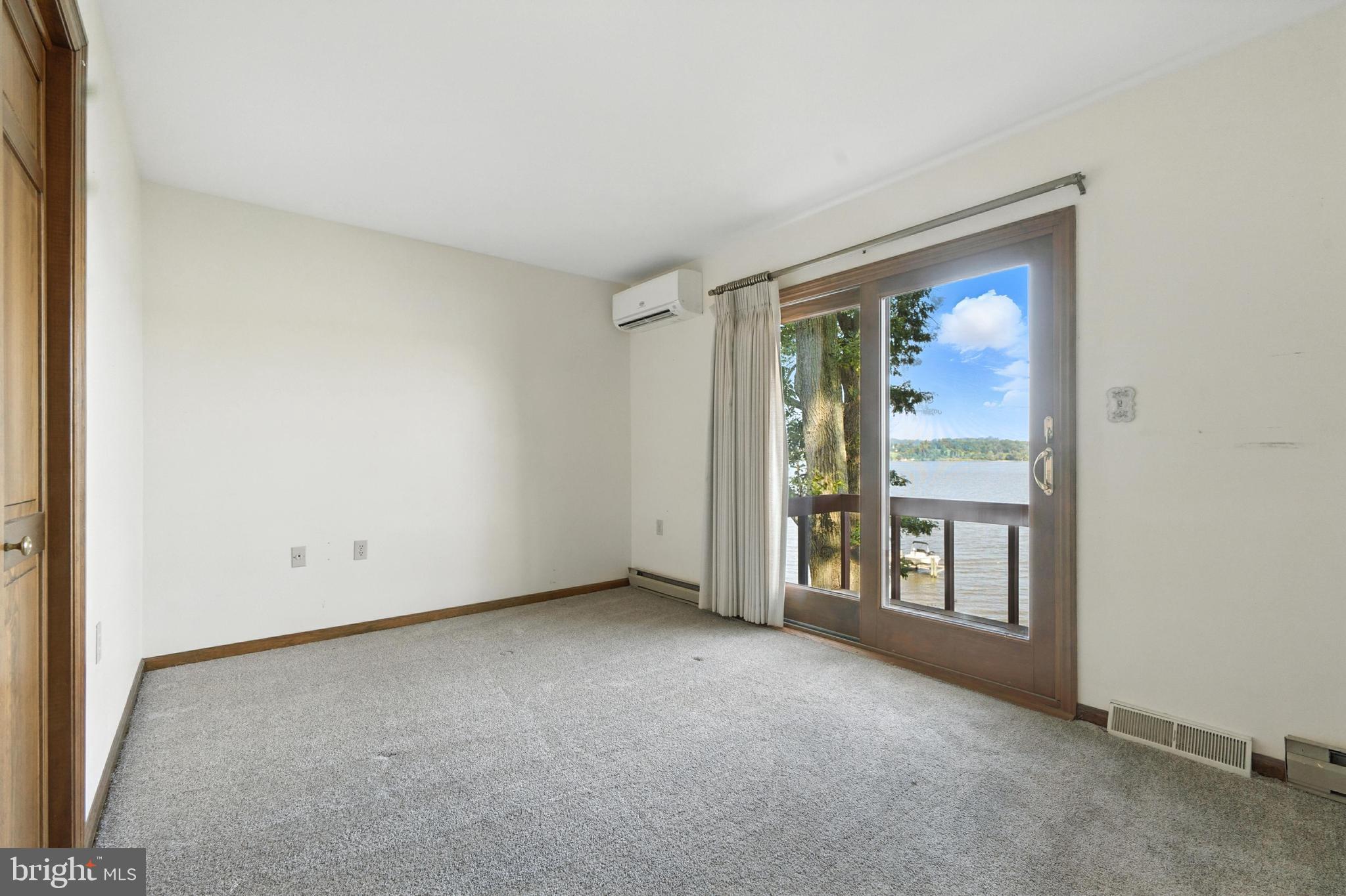 19 Tower Road Chesapeake City, MD 21915 - Photo 16 of 31 an empty room with windows