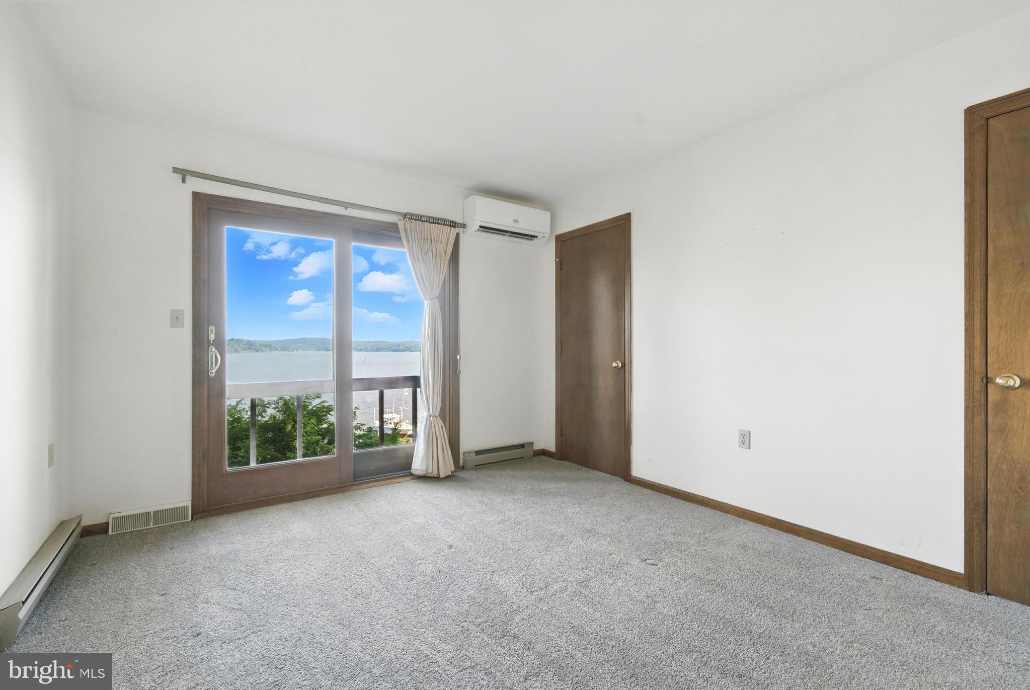 19 Tower Road Chesapeake City, MD 21915 - Photo 19 of 31 a view of an empty room with a window