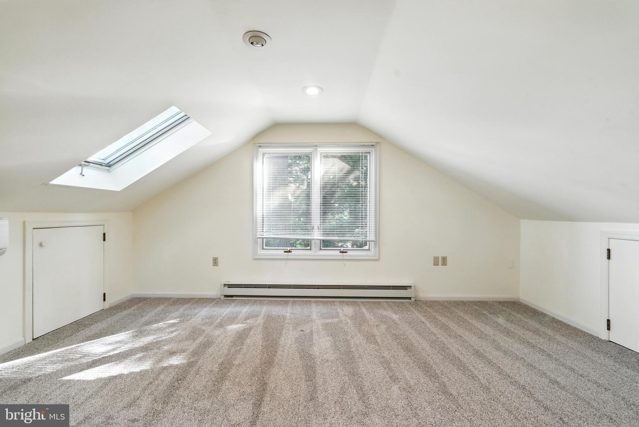 19 Tower Road Chesapeake City, MD 21915 - Photo 21 of 31 an empty room with wooden floor and windows