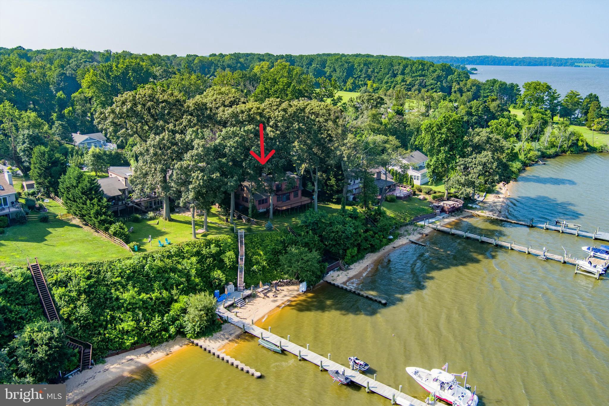 19 Tower Road Chesapeake City, MD 21915 - Photo 5 of 31 a view of a swimming pool with a yard and plants