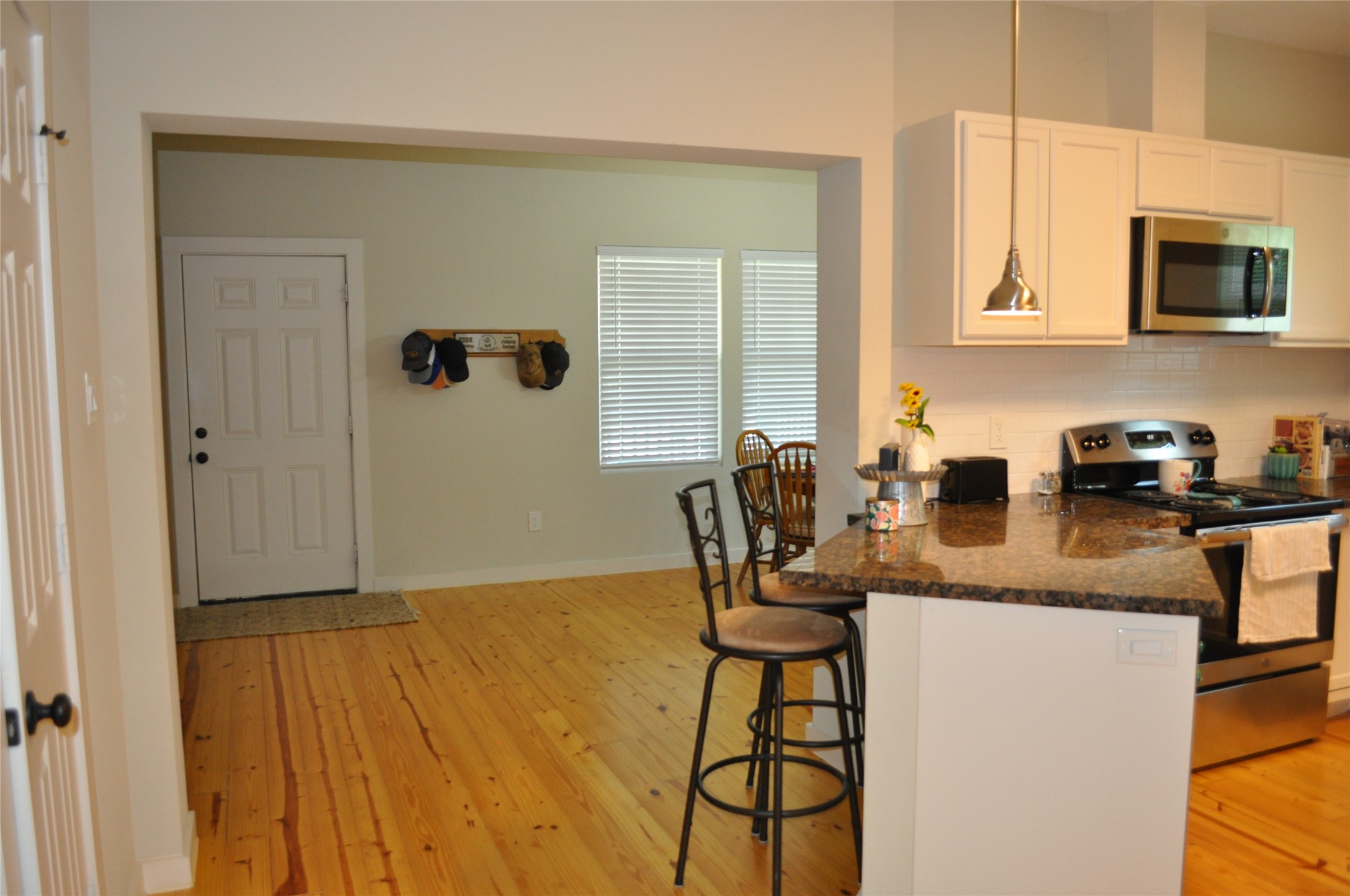 913 Independence Street Brenham, TX 77833 - Photo 15 of 24 a kitchen with a sink cabinets and appliances