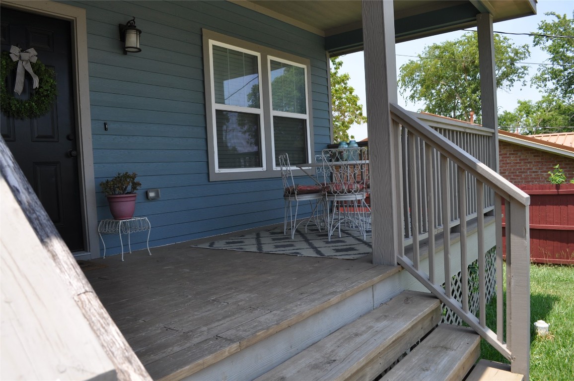 913 Independence Street Brenham, TX 77833 - Photo 2 of 24 a view of deck with furniture and trees