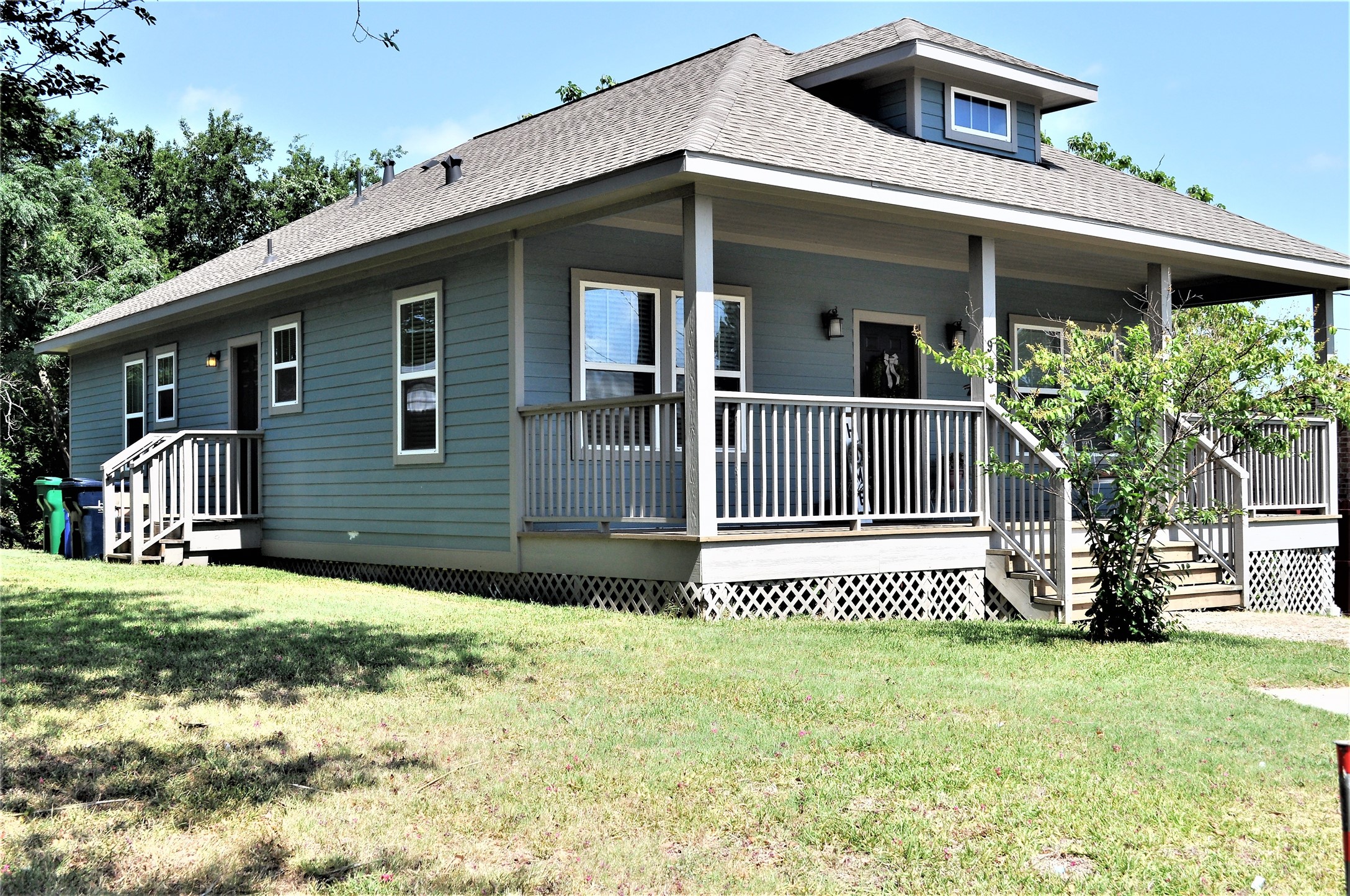 913 Independence Street Brenham, TX 77833 - Photo 4 of 24 a view of a house with a yard