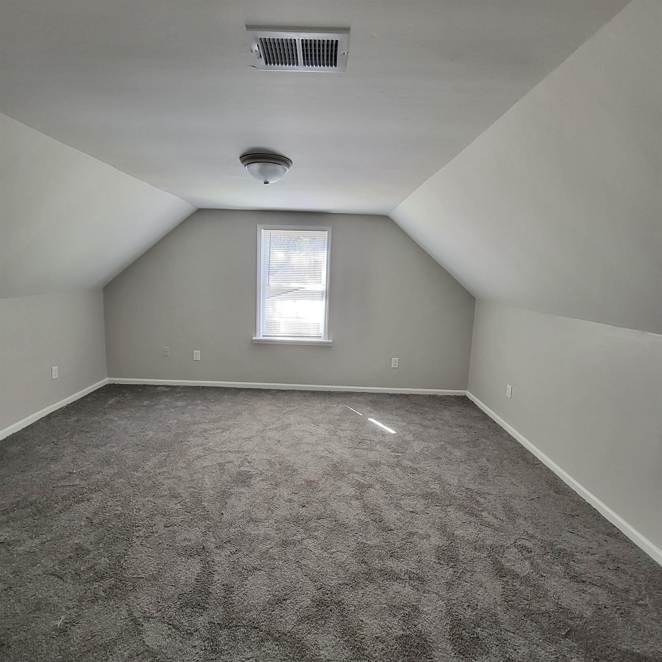 3765 Cazassa Road Memphis, TN 38116 - Photo 12 of 19 an empty room with windows
