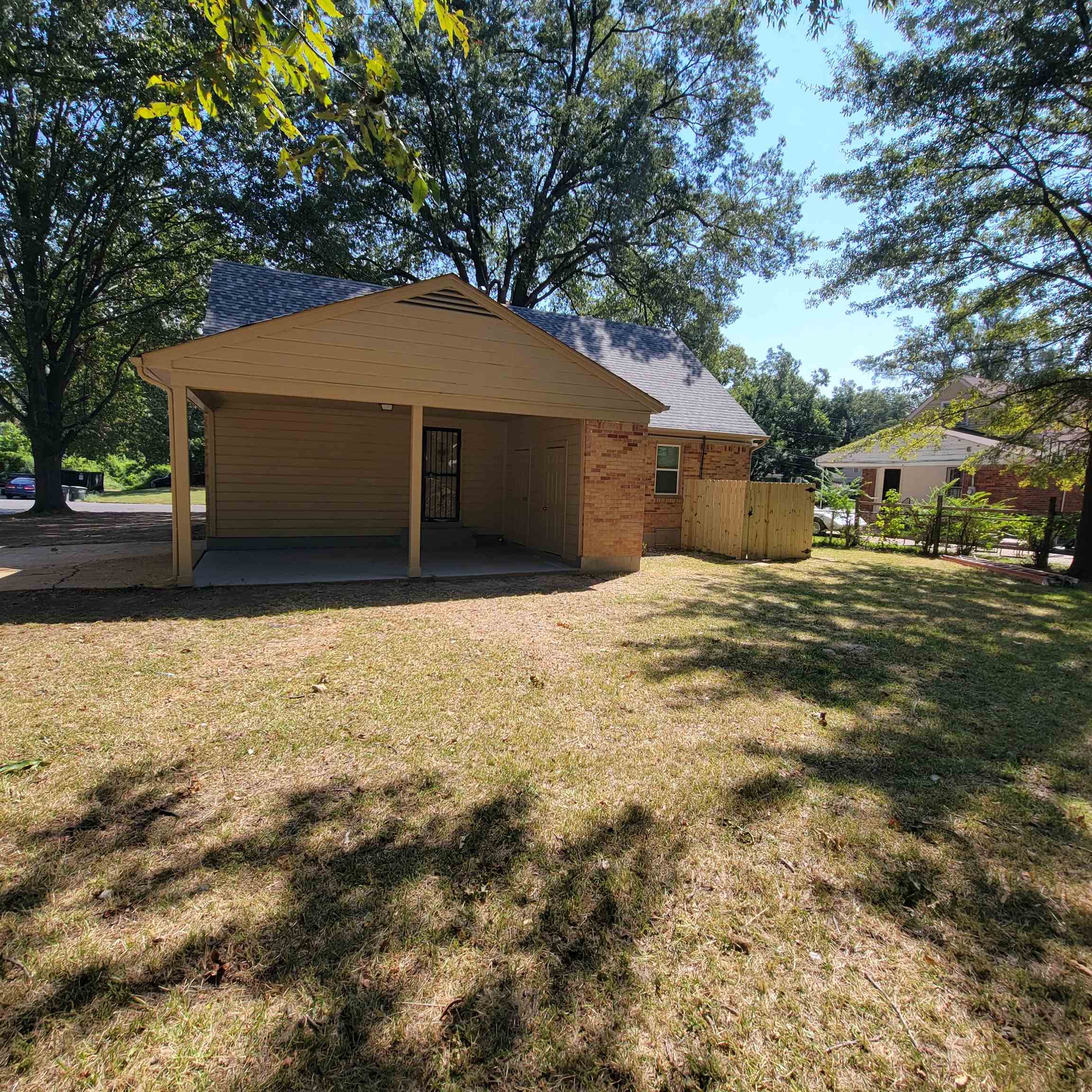 3765 Cazassa Road Memphis, TN 38116 - Photo 2 of 19 a house that has a tree in front of it