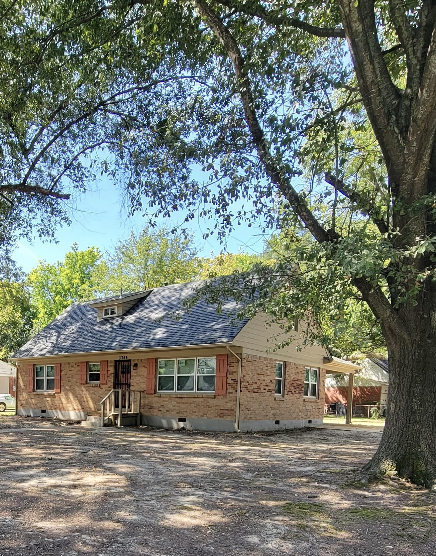 3765 Cazassa Road Memphis, TN 38116 - Photo 3 of 19 a view of a house with a yard