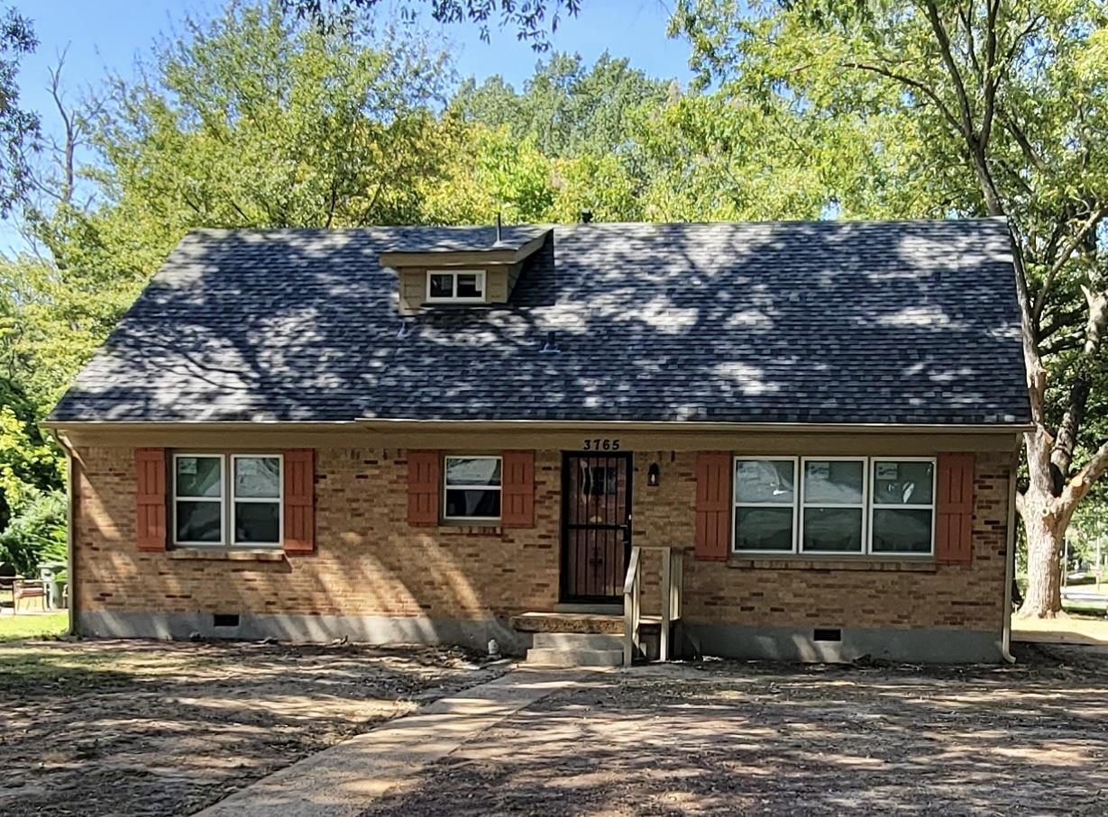 3765 Cazassa Road Memphis, TN 38116 - Photo 4 of 19 a front view of a house with a yard