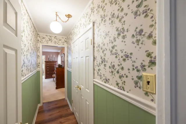 a view of a hallway and interior of a house