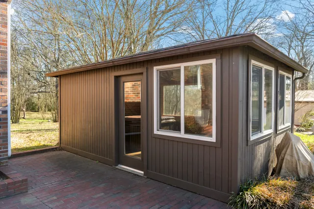 a yellow house with outdoor space