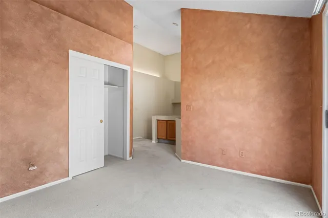 a balcony with trees in front of it