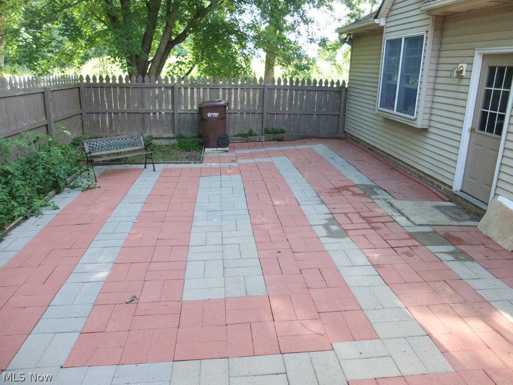 6301 Andalor Street Northwest Canton, OH 44708 - Photo 23 of 24 Patio and fenced area of backyard.