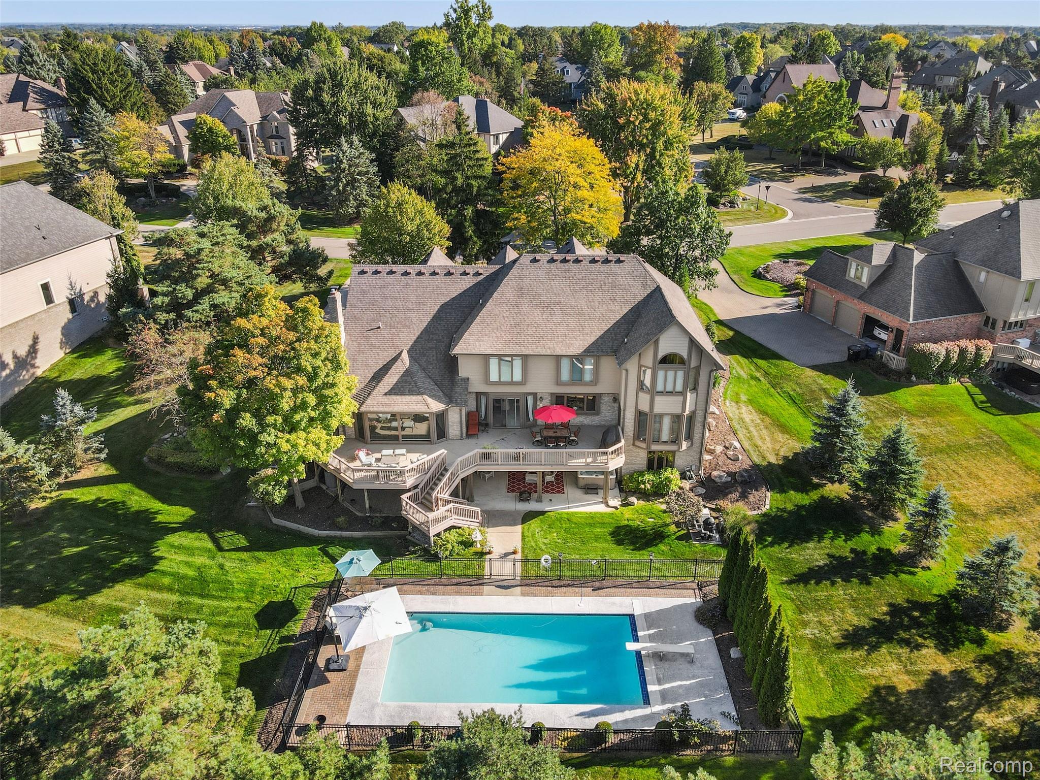 5724 Murfield Drive Rochester, MI 48306 - Photo 14 of 99 Aerial view of residential area featuring a pool