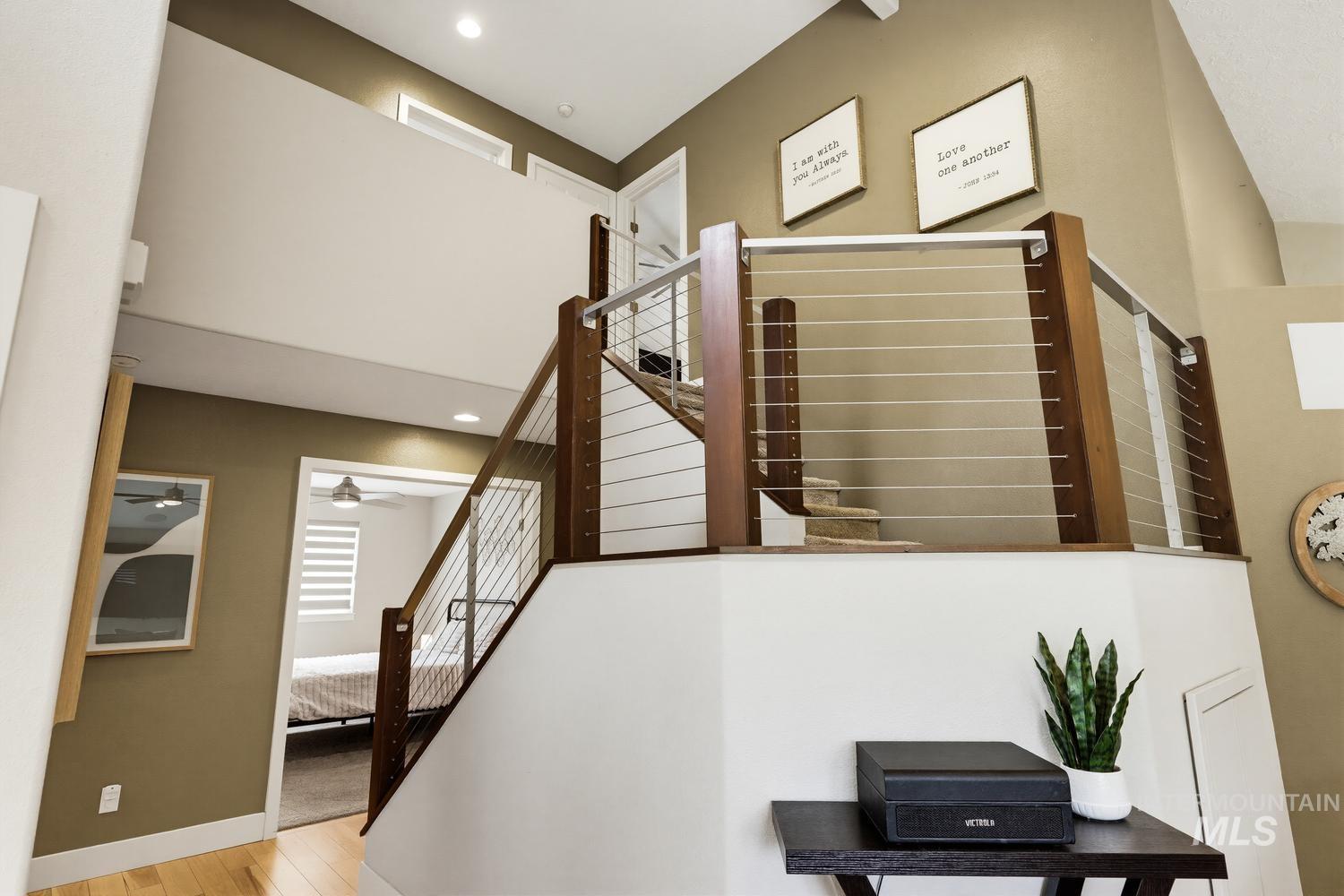 369 South Winthrop Way Boise, ID 83709 - Photo 24 of 50 Modern staircase with cable railing system and wood newel posts