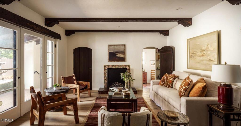 1790 Braeburn Road Altadena, CA 91001 - Photo 2 of 2 a living room with furniture and a large window