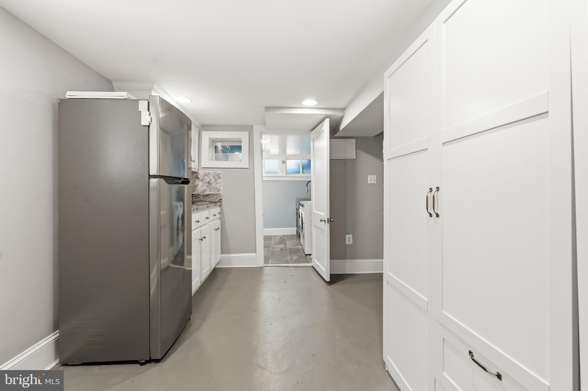 148 Todd Place Northeast Washington, DC 20002 - Photo 25 of 43 a view of a refrigerator in kitchen and a sink