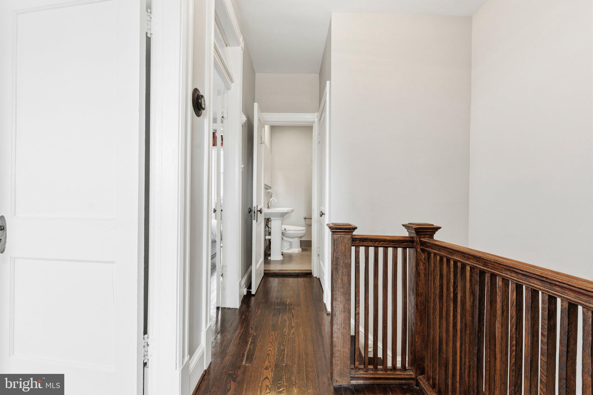 148 Todd Place Northeast Washington, DC 20002 - Photo 31 of 43 a view of a hallway with a white door and stairs