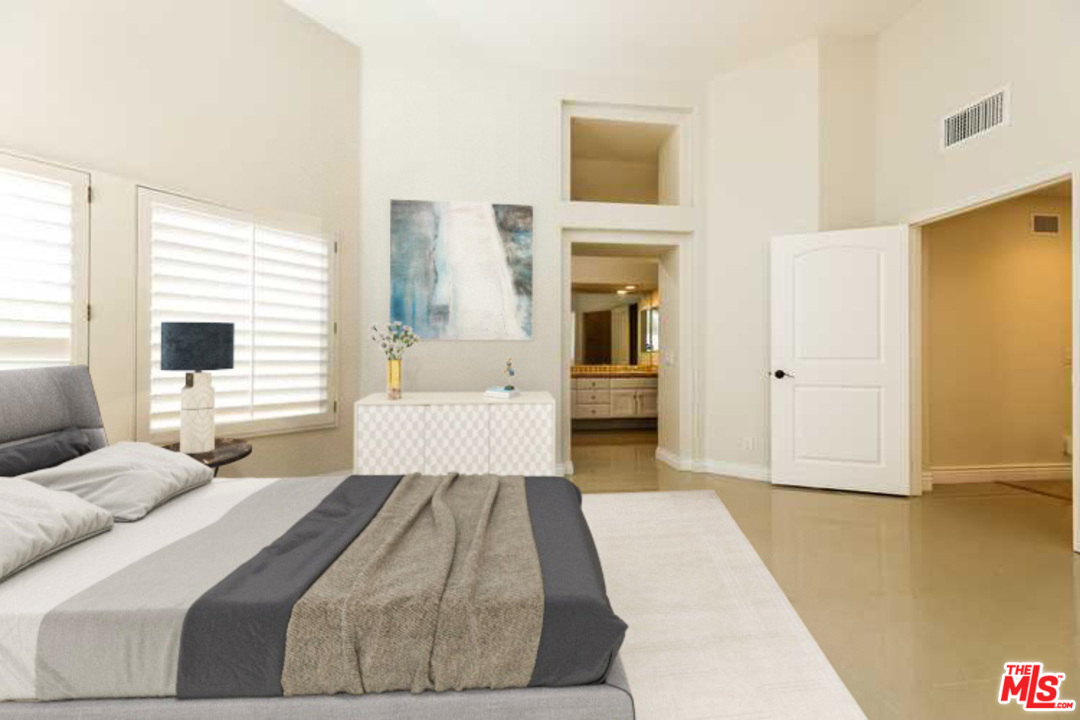 6 Alamitos Foothill Ranch, CA 92610 - Photo 2 of 27 a bedroom with a bed and a couch