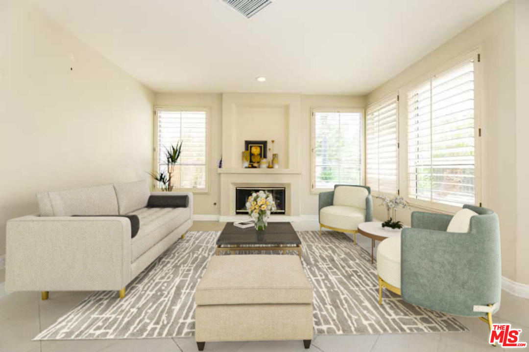 6 Alamitos Foothill Ranch, CA 92610 - Photo 3 of 27 a living room with furniture and a large window