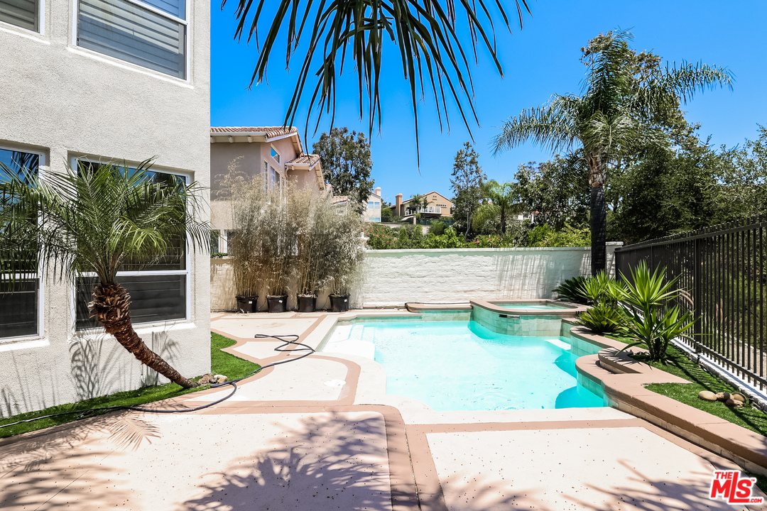 6 Alamitos Foothill Ranch, CA 92610 - Photo 25 of 27 a view of a backyard with plants and a patio