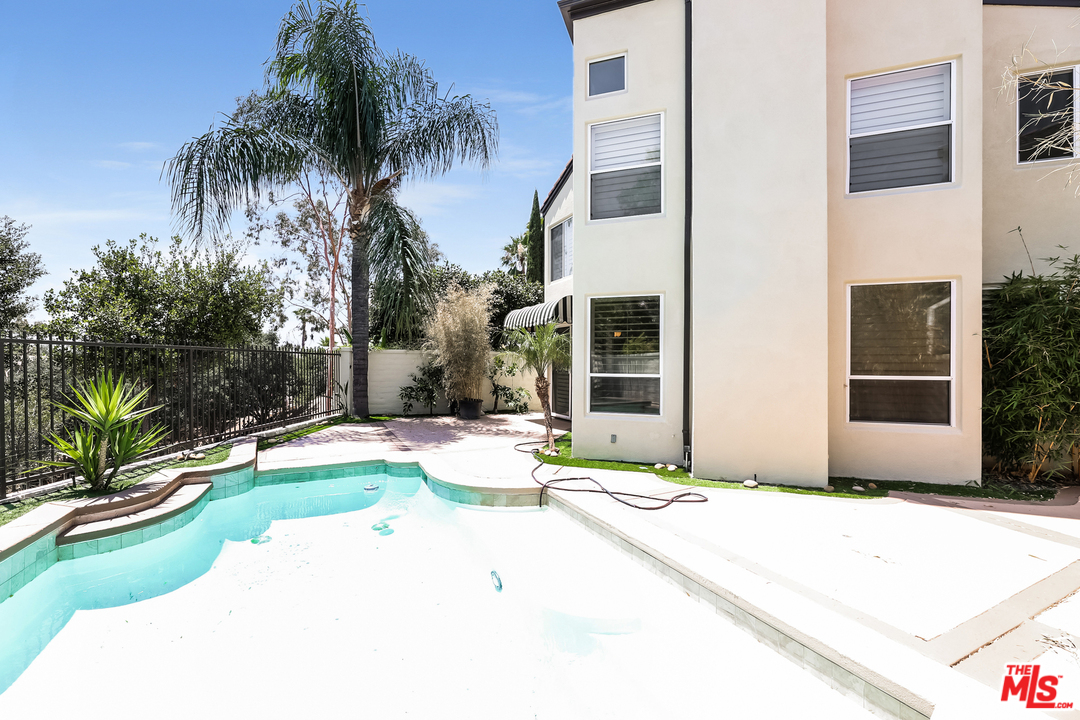 6 Alamitos Foothill Ranch, CA 92610 - Photo 27 of 27 a view of a backyard with palm tree