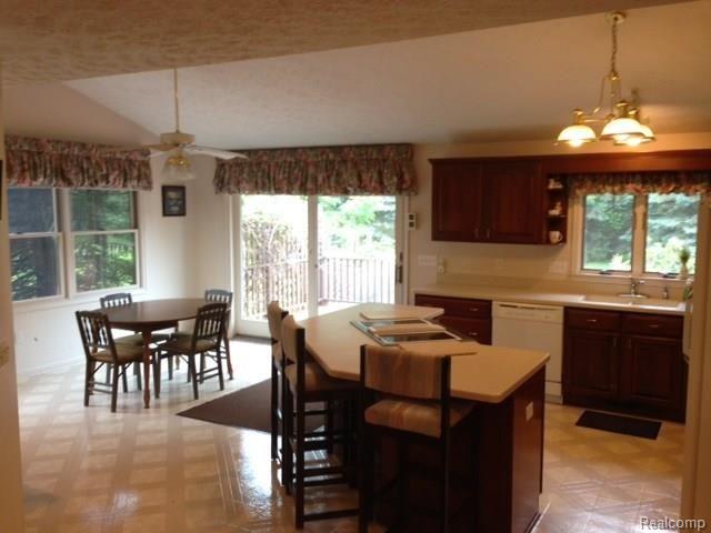 2198 West Barron Road Howell, MI 48855 - Photo 7 of 25 Open and airy breakfast area and kitchen
