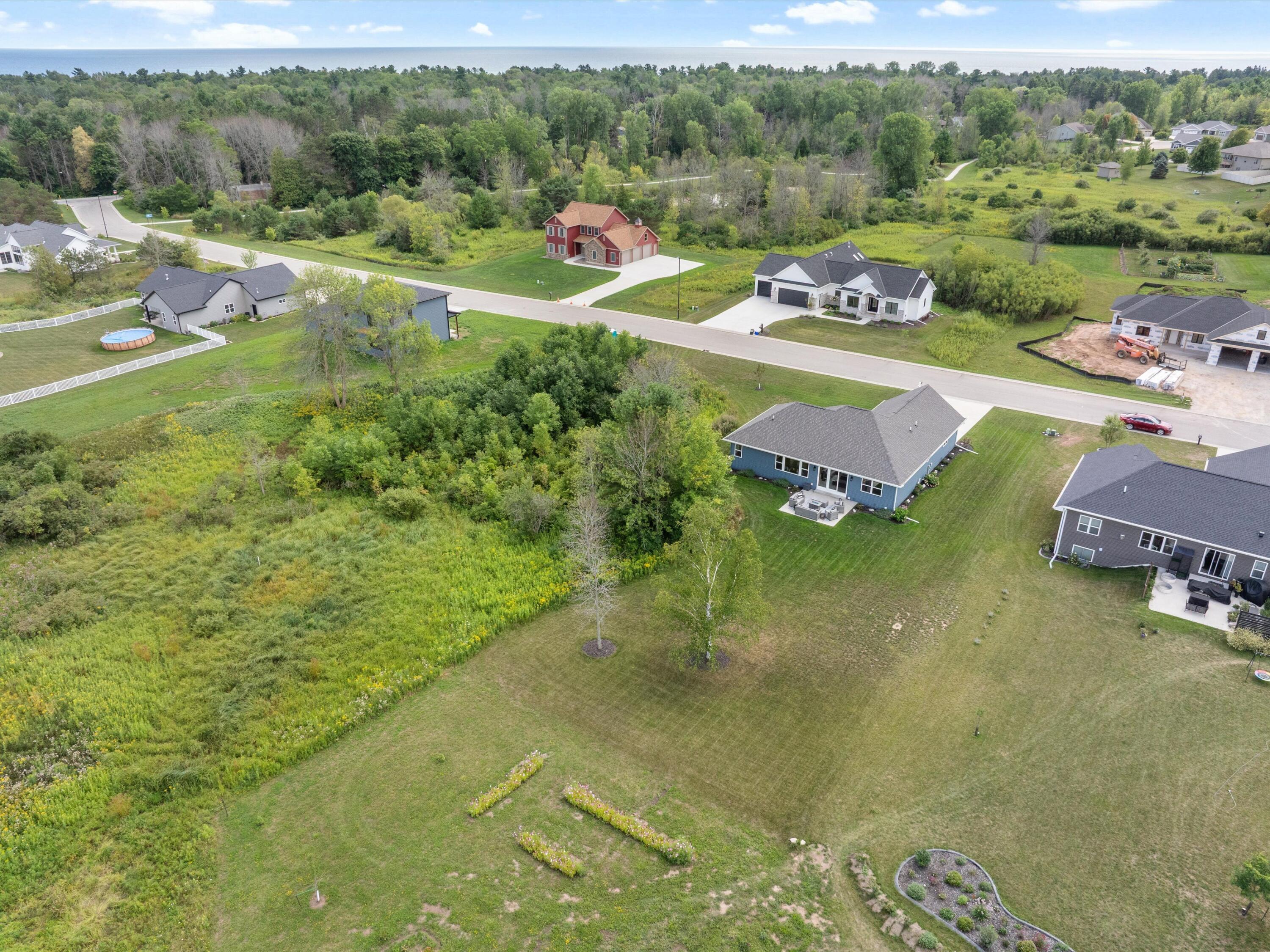 364 Lake Breeze Way Two Rivers, WI 54241 - Photo 37 of 44 08-DJI_20260816131545_0988_D